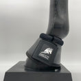 Load image into Gallery viewer, Schwarze Hufglocke mit stoßdämpfendem Neopren Rand und doppeltem Klettverschluss von der Marke Ascot Reitsportartikel.